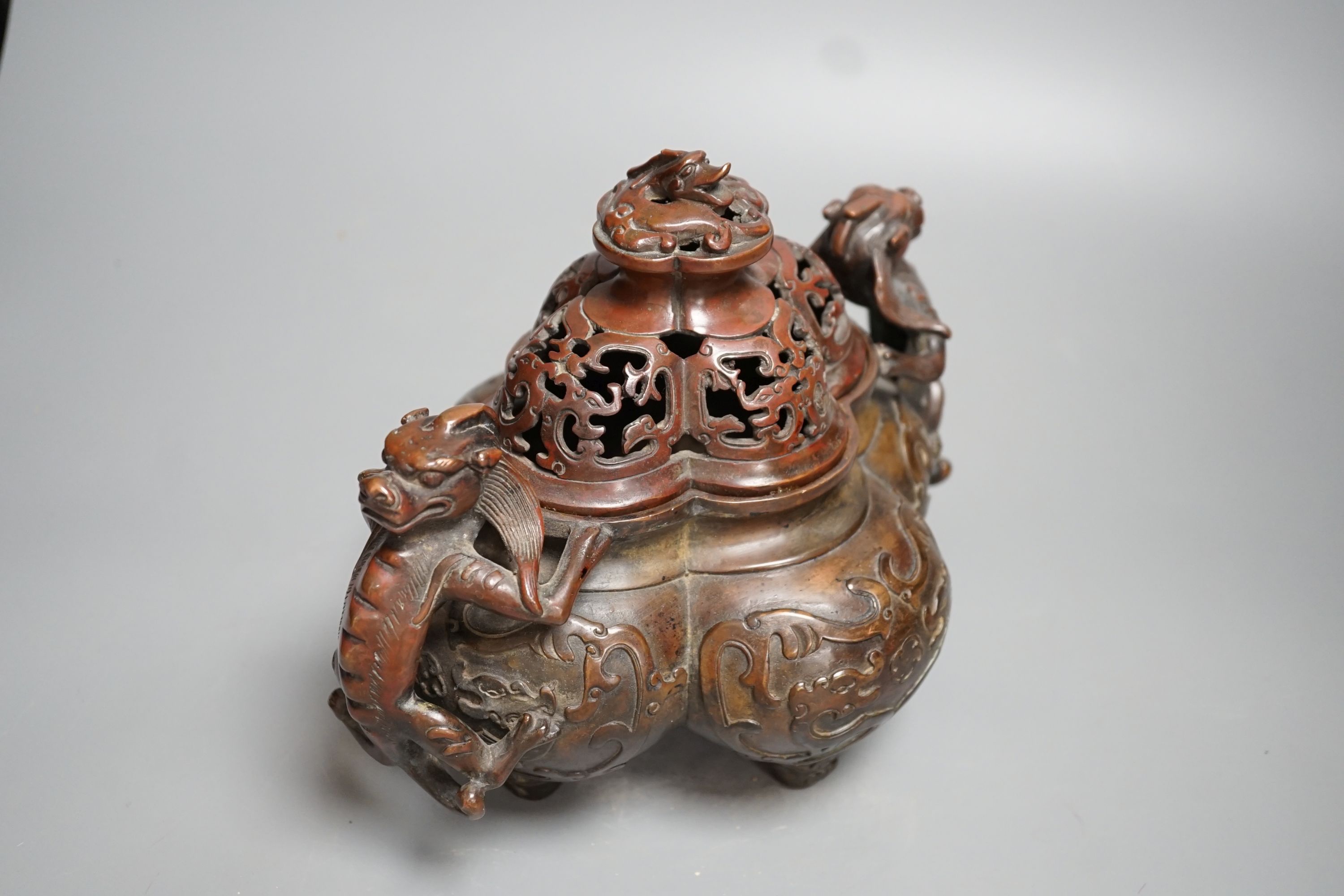 A 19th century Chinese bronze quatrefoil censer, with four character mark - 19cm high